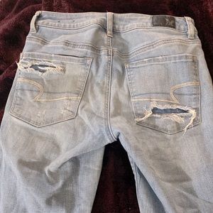 Woman distressed jeans